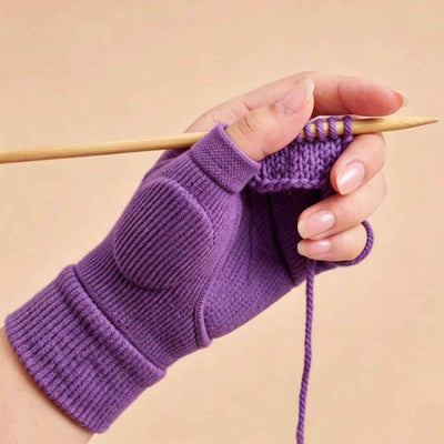 Knitting thumb support